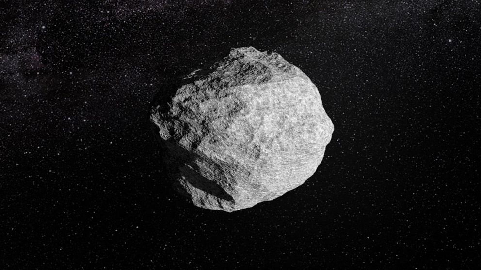 En asteroid svävar i rymden mot en bakgrund av stjärnor.