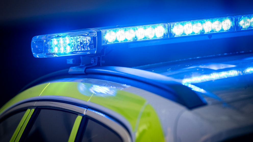 Blåljus på taket på en polisbil
