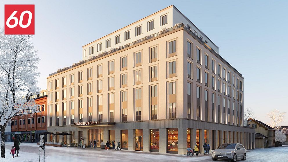 Nybyggt hotell med modern arkitektur i stadsmiljö en vintrig dag.