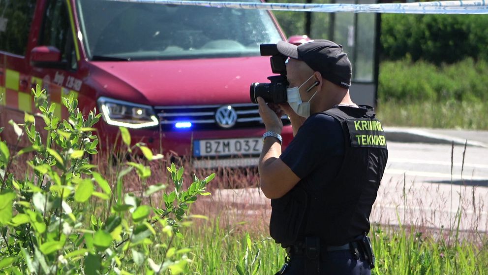Polisfotograf vid mordplats i Hamrånge
