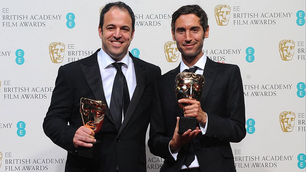 Malik Bendjelloul (th) med Simon Chinn vid Baftagalan i London 2013. Foto: Scanpix