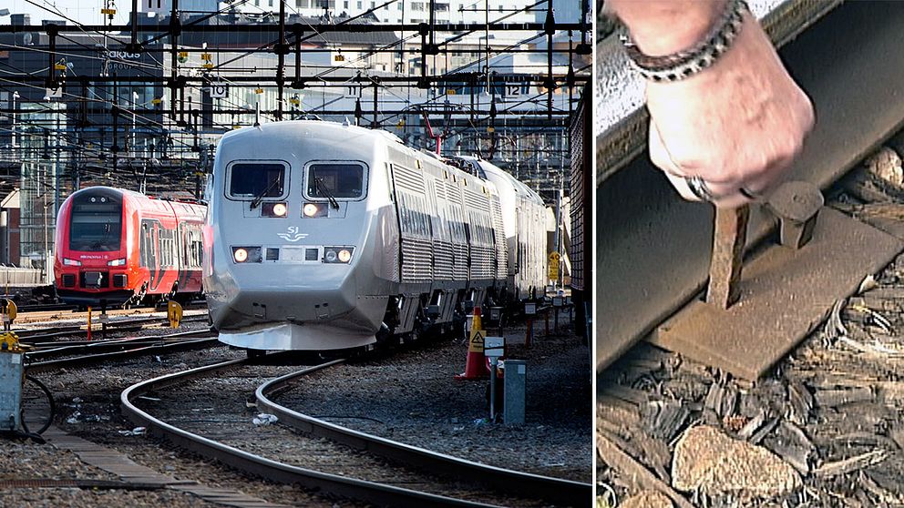 Tåg på räls och en hand som trycker ner en större spik