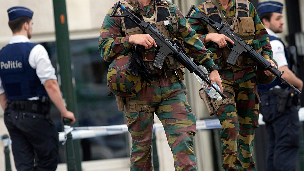 Belgisk polis och militär. Arkivbild.