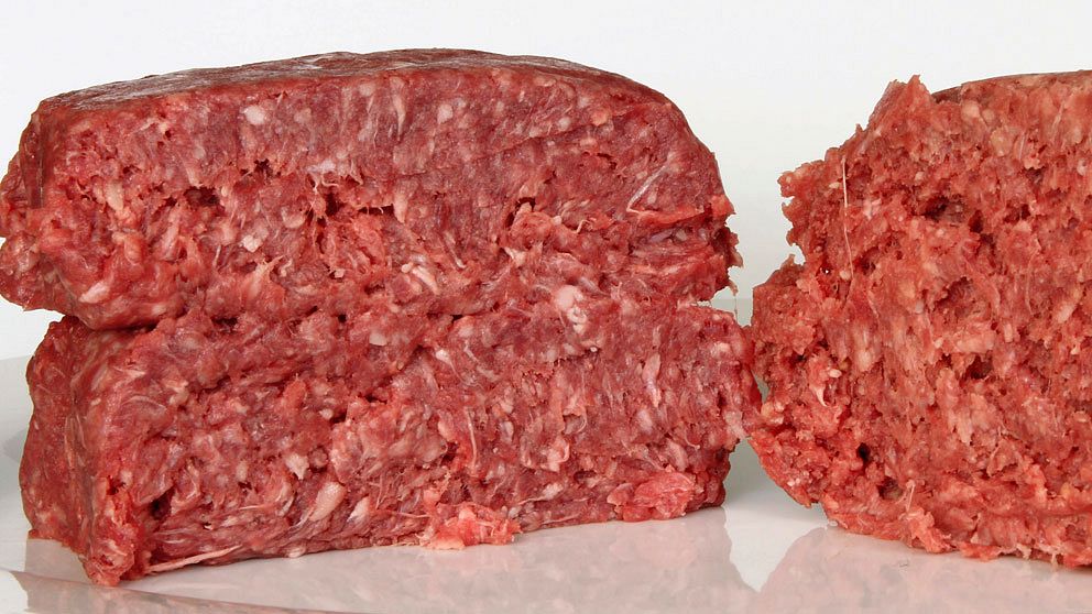 This Thursday, March 15, 2012 photo shows ground beef containing what is derisively referred to as 'pink slime,' or what the meat industry calls 'lean, finely textured beef,' right, and pure 85% lean ground beef, in Concord, N.H. Under a change announced Thursday by the U.S. Department of Agriculture, districts that get food through the government's school lunch program will be allowed to say no to ground beef containing the ammonia-treated filler and choose filler-free meat instead. The low-cost filler is made from fatty meat scraps that are heated to remove most of the fat, then treated with ammonium hydroxide gas to kill bacteria such as E. coli and salmonella. (AP Photo/Jim Cole)
