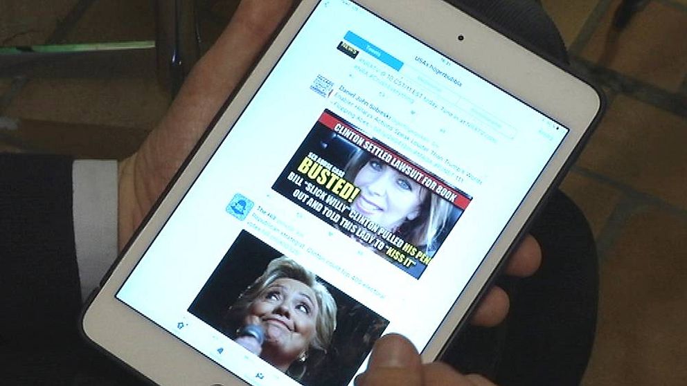 En padda som visar bild på bland annat Hillary Clinton.