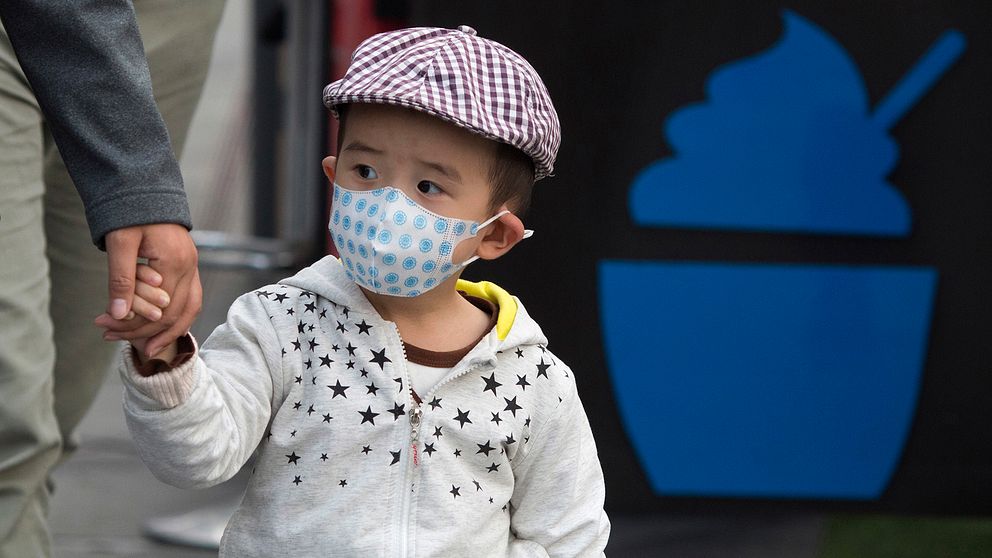 Ett barn i Peking som ofta lider av luftföroreningar.