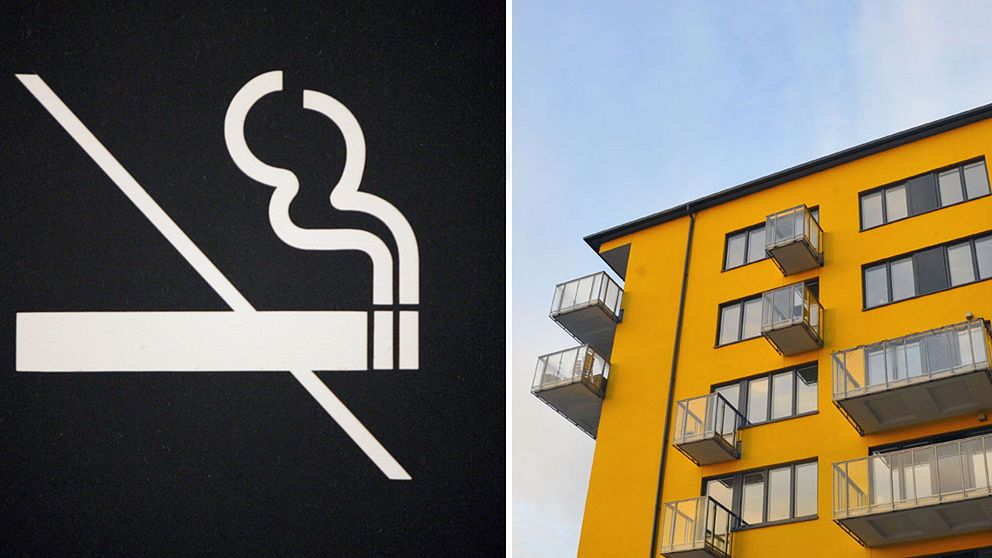 En rökförbud-skylt samt ett lägenhetshus.