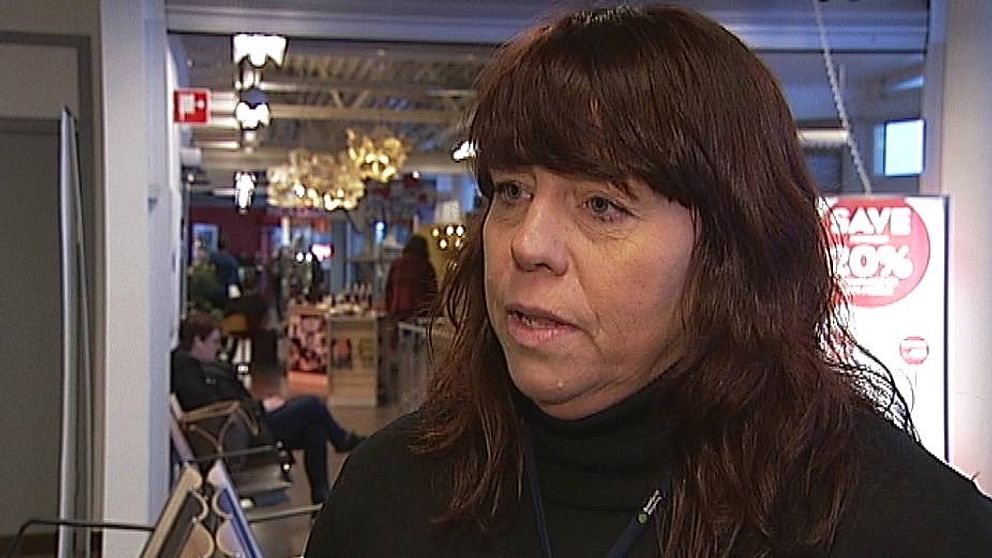 Mörkhårig kvinna, flygplatschefen Susanne Norman