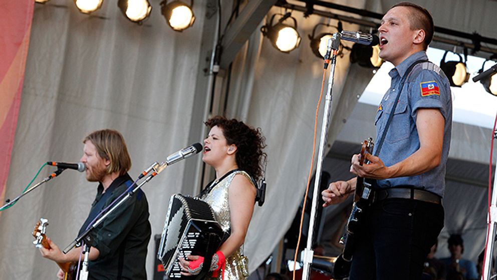 Tim Kingsbury, Régine Chassagne och Win Butler i Arcade Fire.