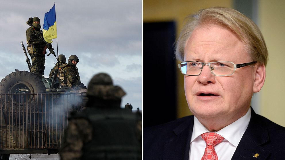Ukrainska regeringsstyrkor och en bild på Sveriges försvarsminister Peter Hultqvist.