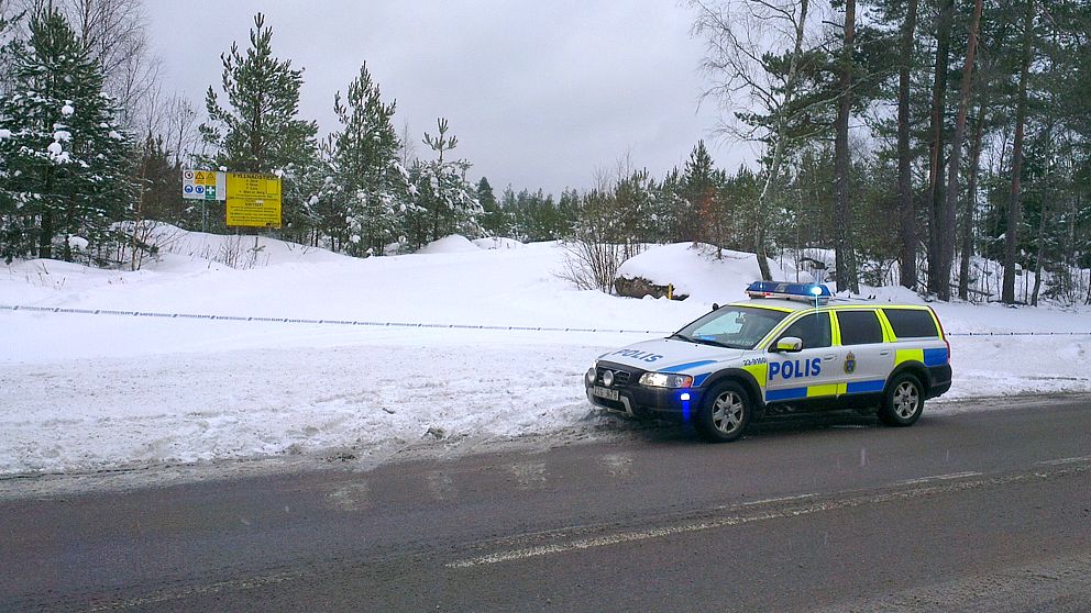 Polisbil vid avspärrning