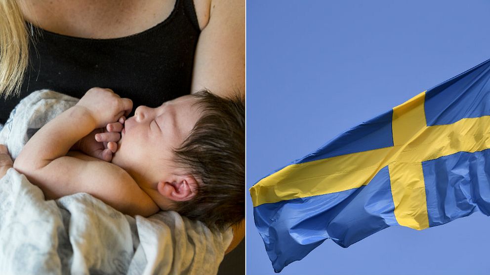 Kvinna med baby i famnen. Svensk flagga