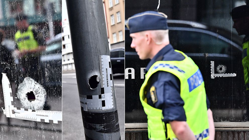 Skotthål i fönsterruta, skotthål i stolpe och polis vid skottskadad ruta på Drottninggatan i Malmö.