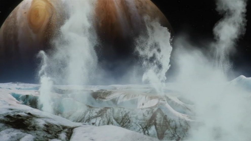 Datorskapad bild på gejsrar på månen Enceladus sprutar ut vatten flera hundra kilometer ut i rymden.