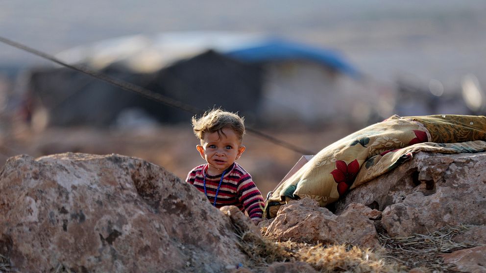 Ett barn i närheten av ett flyktingläger i Idlib i norra Syrien.