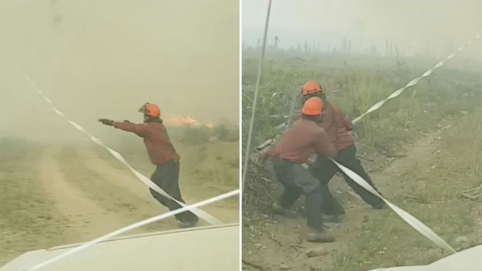 Här kämpar brandmännen mot eldtornadon.