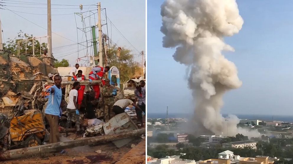 Hjälparbetare vid attentatsplatsen står kring och på en utbränd bil. Till vänster en plym av rök från en av explosionerna i Mogadishu.