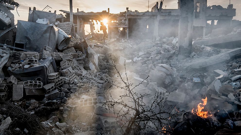 Förstörda hus i staden Kobane i norra Syrien i mars 2015.