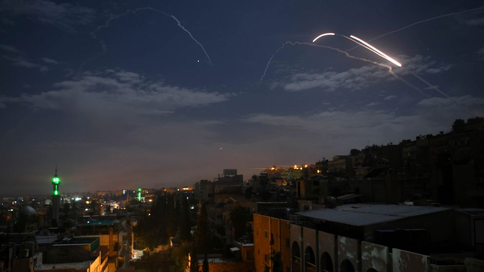Bild över Damaskus under Israels attack.