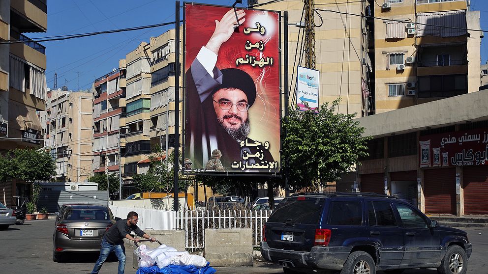 Hizbollahs ledare Sayyed Hassan Nasrallah på en affisch i Libanon.