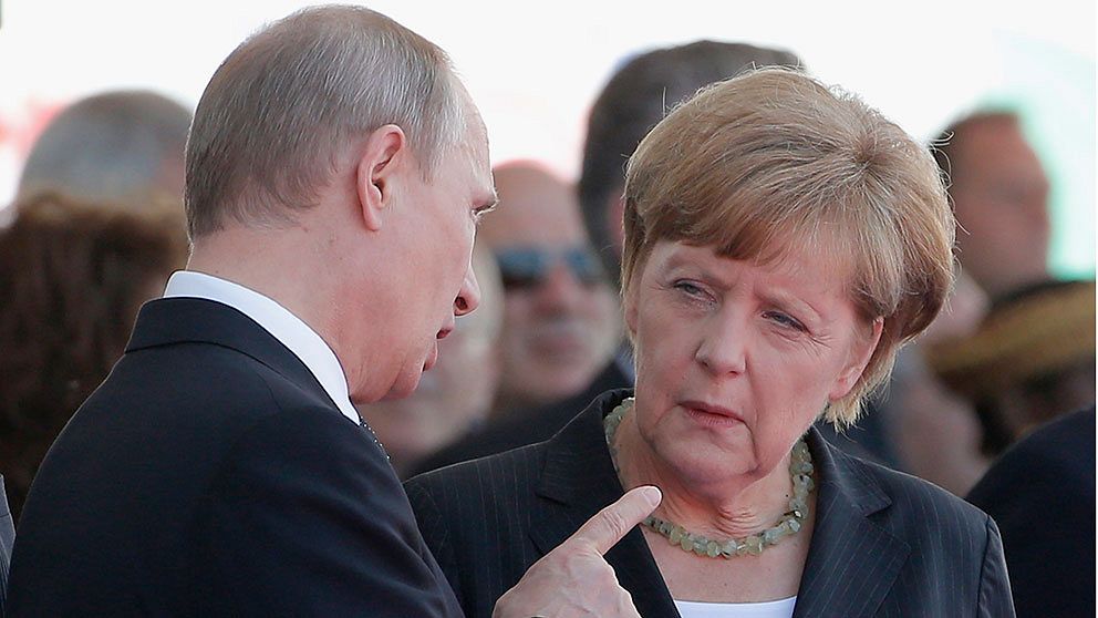 Vladimir Putin och Angela Merkel.