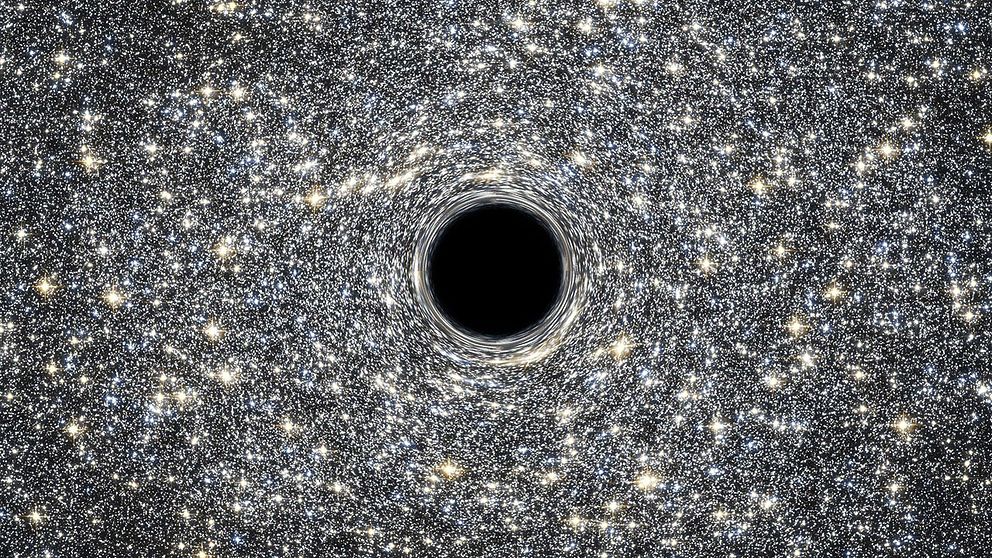 En illustration av det supermassiva svarta hål som forskarna upptäckt i galaxen M60-UCD1.