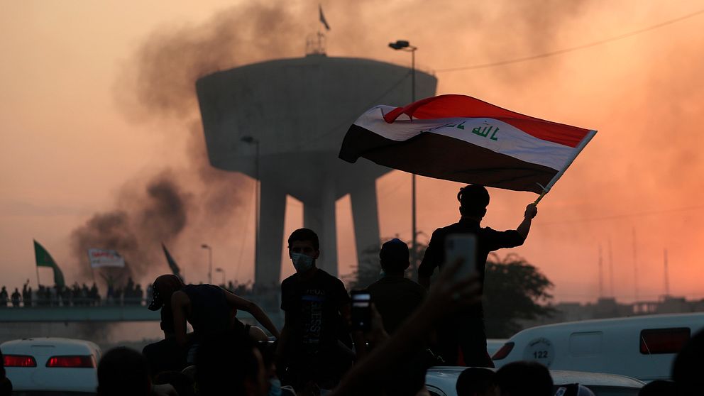 Regeringskritiska demonstranter i Bagdad.
