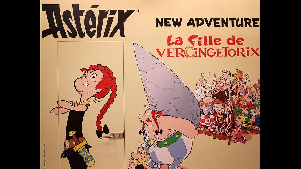 Ett litet steg för människan, ett bautasteg för Asterix. En reklamskylt för nya albumet ”La fille de Vercingétorix”.