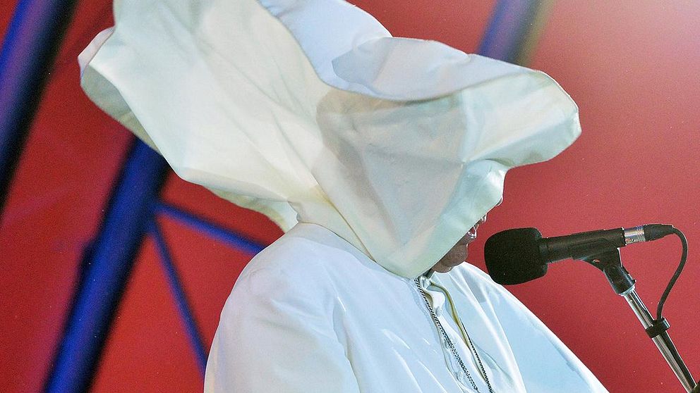 The wind blows Pope Francis's mantle as he speaks at Copacabana beach in Rio de Janeiro, Brazil during the World Youth Day on July 25, 2013. The first Latin American and Jesuit pontiff arrived in Brazil mainly for the huge five-day Catholic gathering World Youth Day. On the fourth day of his visit to Brazil and borne along by adoring crowds, Pope Francis waded into the country's ramshackle slums and onto the front line of its fierce national battle over poverty and corruption, before going to the much wealthier district of Copacabana for his welcome by the youth