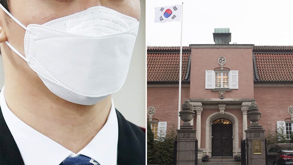 Man med munskydd och Sydkoreas ambassad på Laboratoriegatan i Stockholm.