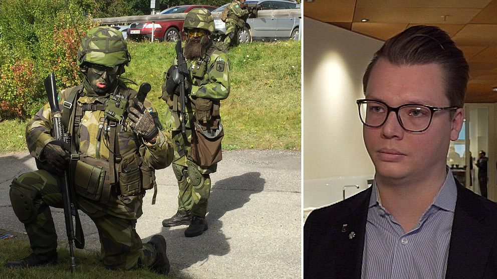 Sollefteås kommunalråd Johan Andersson (C) och uniformerade militärer under övning.