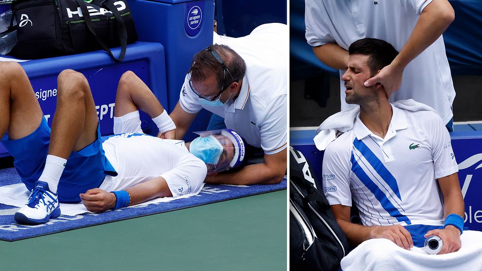 Världsettan Novak Djokovic får behandling för en nackskada under pågående match.