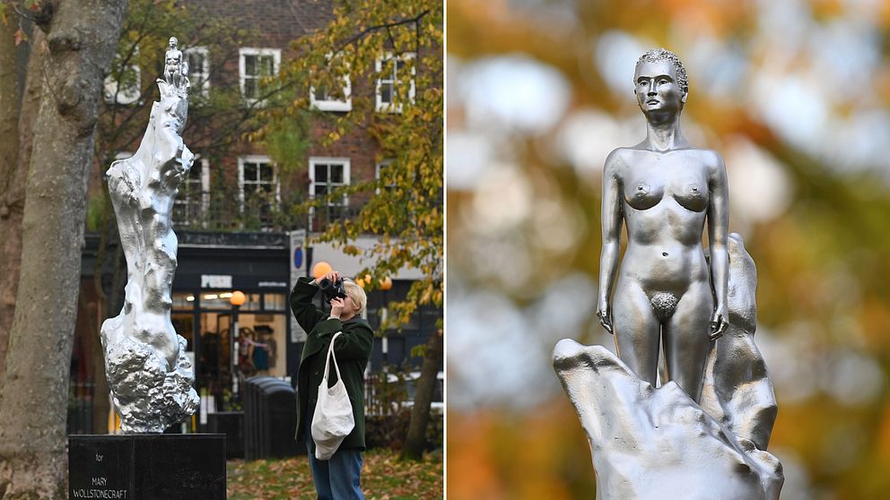Statyn av feministikonen och författaren Mary Wollstonecraft och en person som fotograferar den.