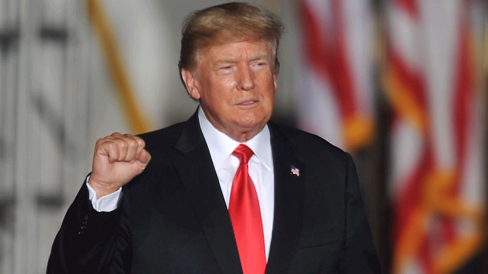 epa09515992 Former US President Donald J. Trump gestures to supporters at a Save America rally at the Iowa State Fairgrounds in Des Moines, Iowa, USA, 09 October 2021. The rally highlights Trumps first visit to Iowa since the general election in November 2020. EPA/STEVE POPE