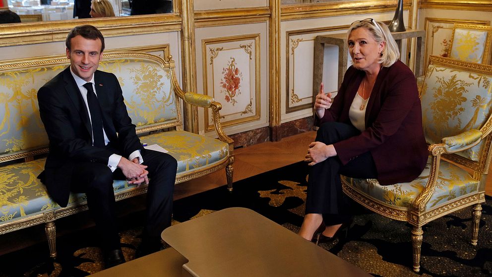 President Emmanuel Macron och Nationell samlings Marine Le Pen