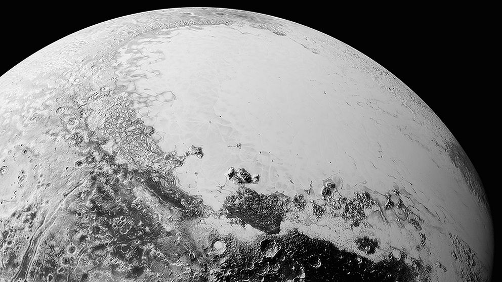 Pluto som du skulle se den om du var endast 1.800 kilometer bort.