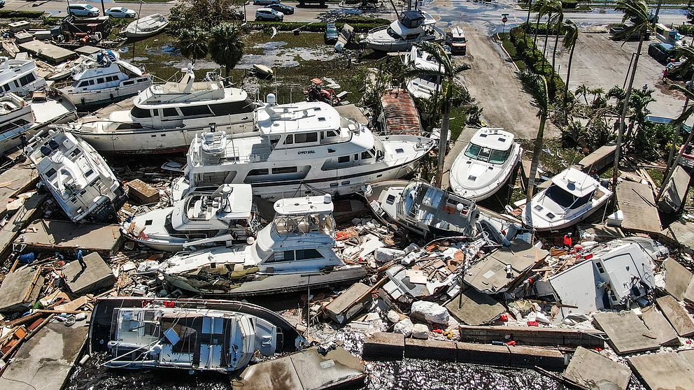Stormen Ian har orsakat stor förödelse där den dragit fram. Här är spåren efter orkanen i en hamn i Fort Myers, Florida.