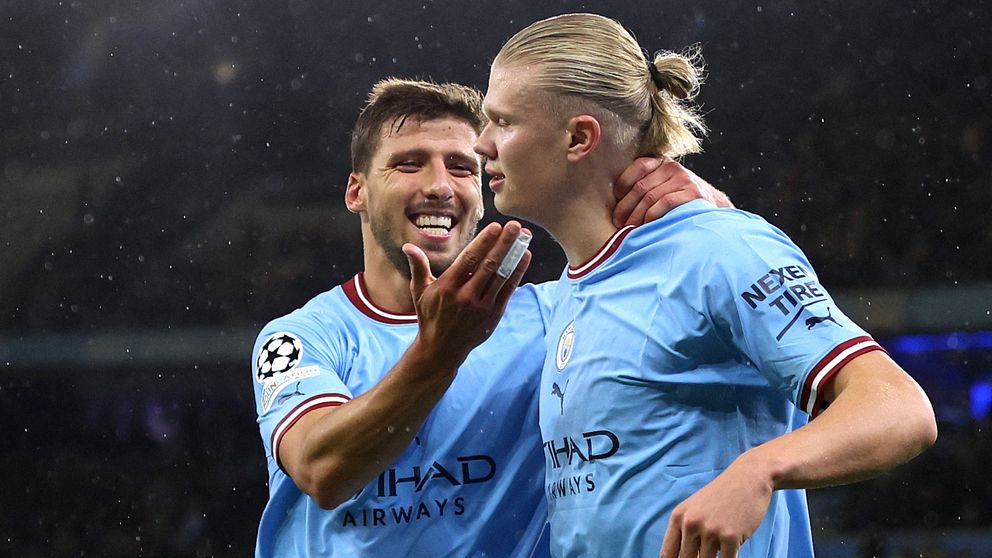 Erling Braut Haaland firar med Ruben Dias.