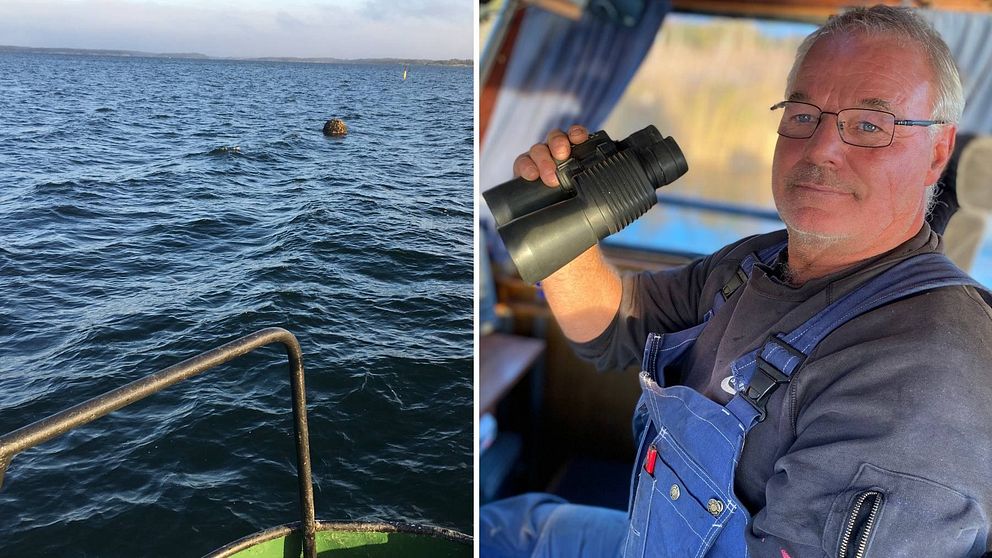 Tony Jakobsson spejar med en kikare över vattnet från förarhytten i sin båt. Till vänster i bild syns en av de sjöminor han upptäckte under en båtfärd.