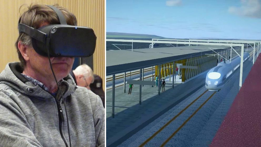 Besökare tittar i VR-glasögon på den animerade järnvägsstationen i Kiruna.