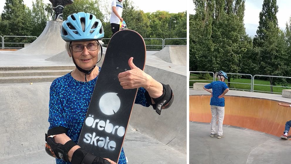 En äldre kvinna står och räcker tumme-upp med en skateboard i handen.
