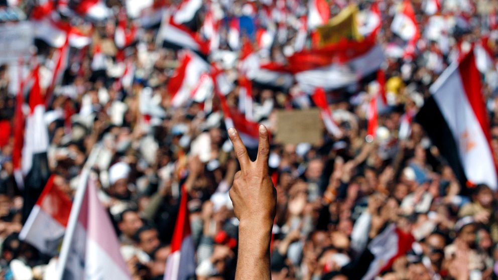 Bild på demonstranter i Egypten 2011.