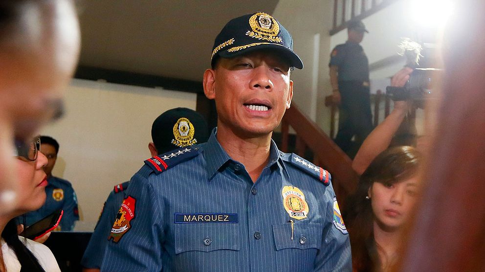 Filippinska polisens Ricardo Marquez talar till media om gisslanärendet i slutet av april.