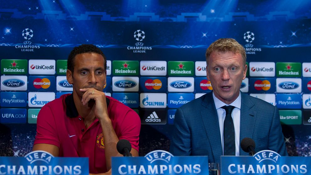 Förre United-spelaren Rio Ferdinand tillsammans med senare sparkade tränaren David Moyes.