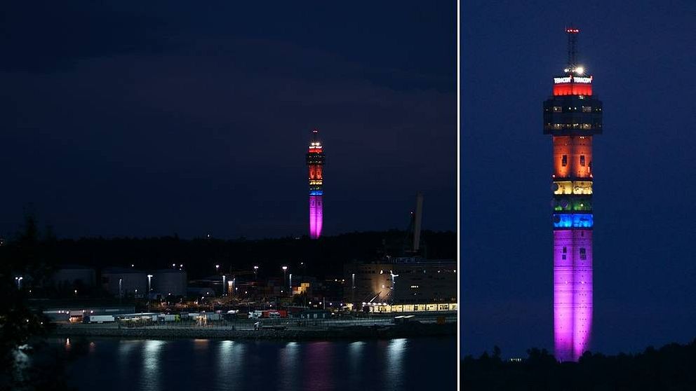 Kaknästornet på Gärdet i Stockholm, upplyst i regnbågens färger.