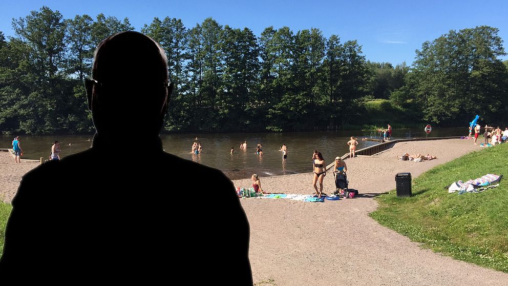 Silhouette på en man med bild på en badplats i bakgrunden.