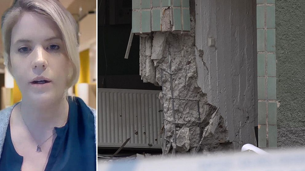 Kvinna till vänster i bild, till höger trasig vägg med löst murbruk