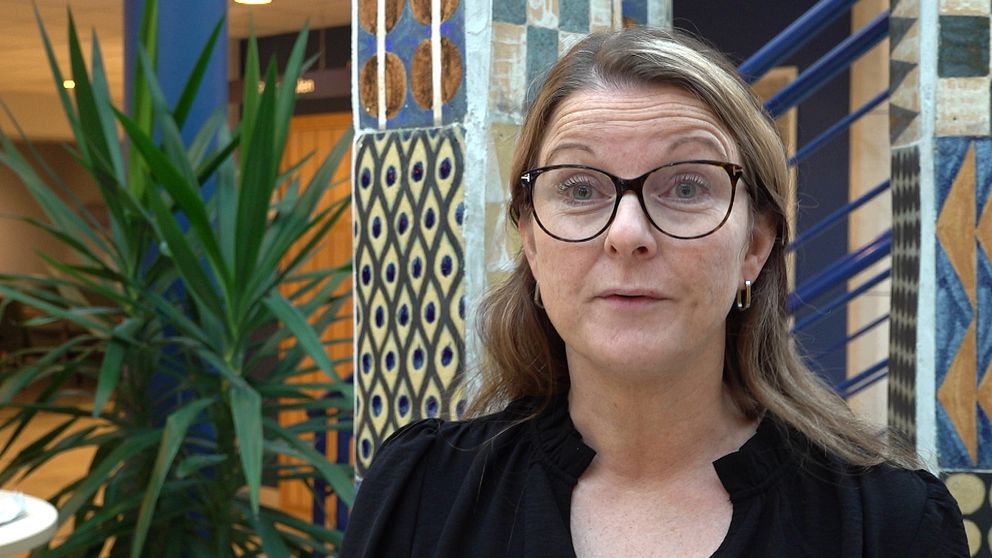 Kvinna med glasögon