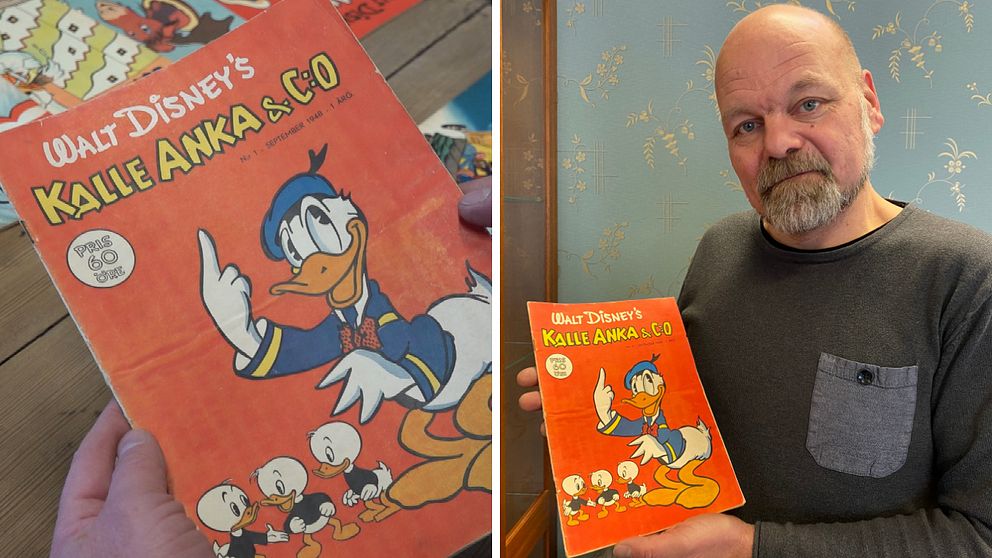 En man håller upp en Kalle Anka-tidning från 1948