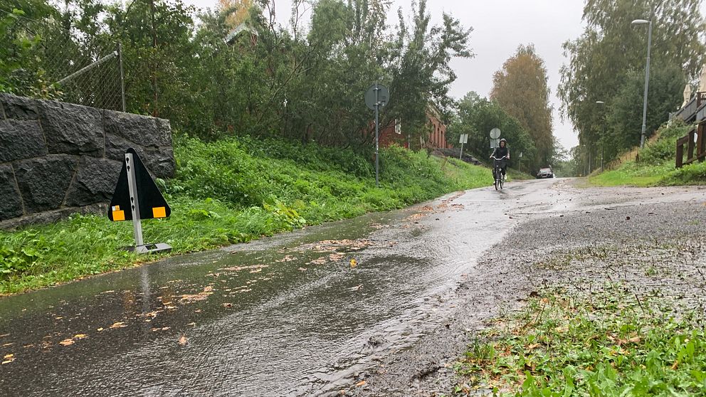 Regn Umeå, cyklist, vatten